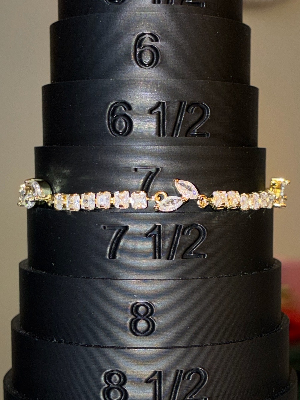 Gold-Tone CZ Tennis Bracelet with Marquise Accent in Gold